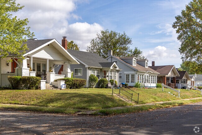 A row of Craftsman and Cape Cod styled homes in the Industry neighborhood of Muncie, IN.