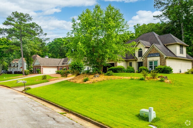 Well-spaced homes and carefully maintained lawns are hallmarks of Audubon Forest.
