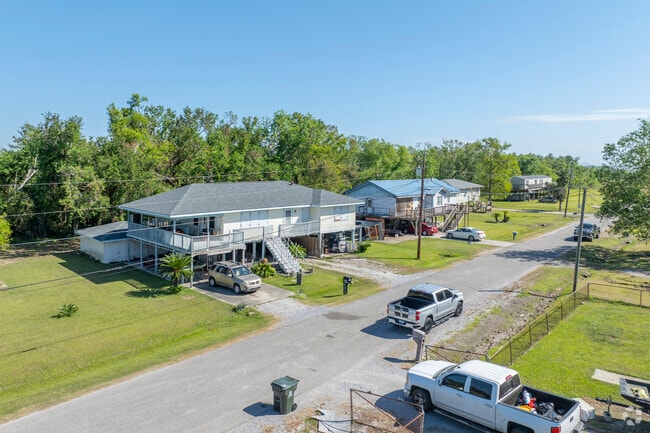 Ranch style homes on stilts are common throughout Dulac.