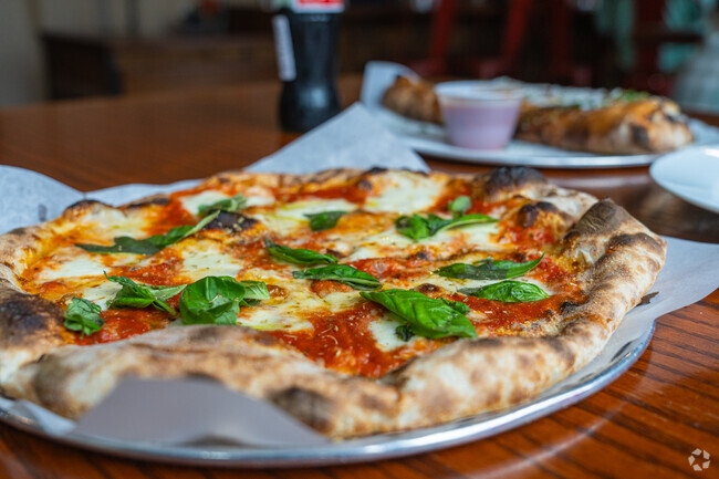 Enjoy mouth watering wood fired pizza at La Pizzeria Metro, just outside of Riverside.