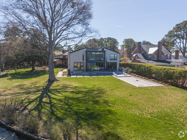 Modern contemporary homes line Riverpoint's water's edge.