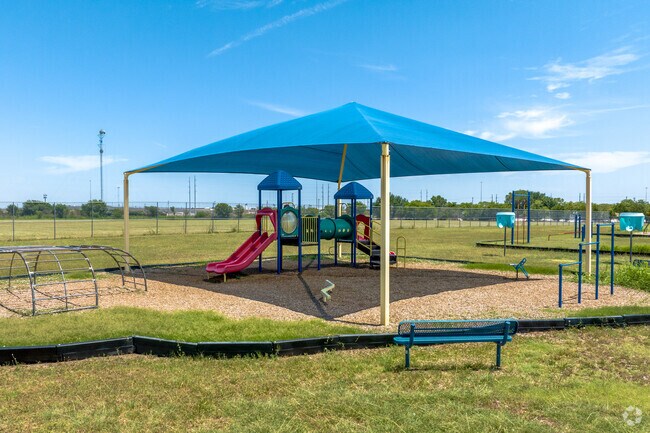 Cesar Chavez Primary has a covered playground protecting students from the heat in Fort Worth.