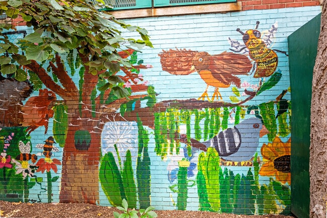 PS 75 Emily Dickinson adorns its walls with murals.