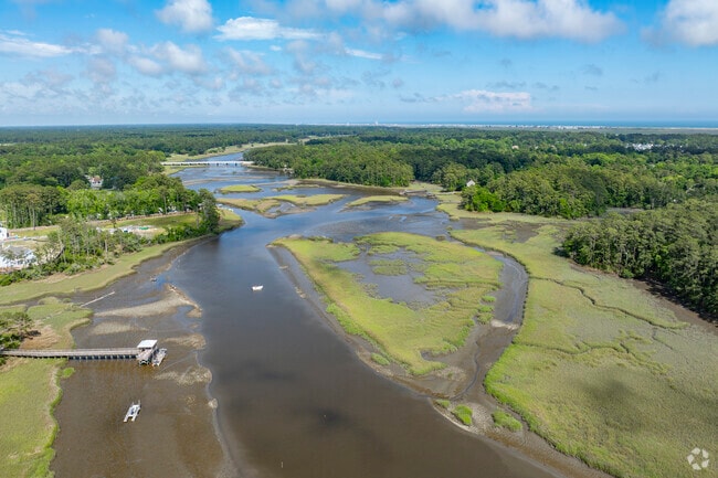 Calabash, NC, is distinguished by its gently rolling terrain and proximity to the Calabash River, which meanders through the town, enhancing its scenic beauty.