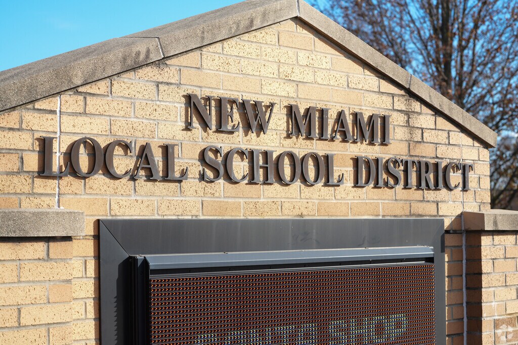 The New Miami School District signage.