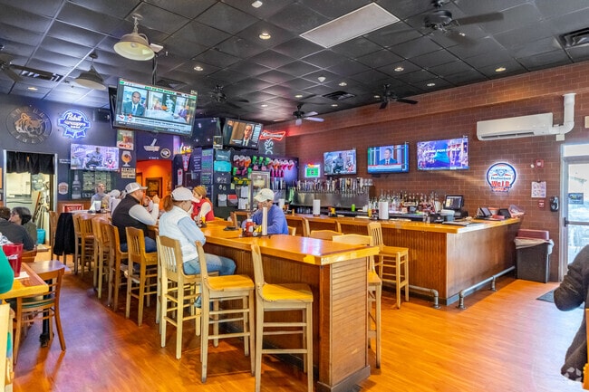 Grumpy's Sports Pub in the Woodside area is know for it's very extensive beer selection on tap.