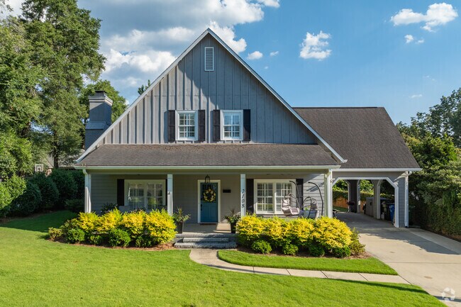 Craftsman-style bungalows are common in Garrard Woods featuring gabled roofs and exposed rafters