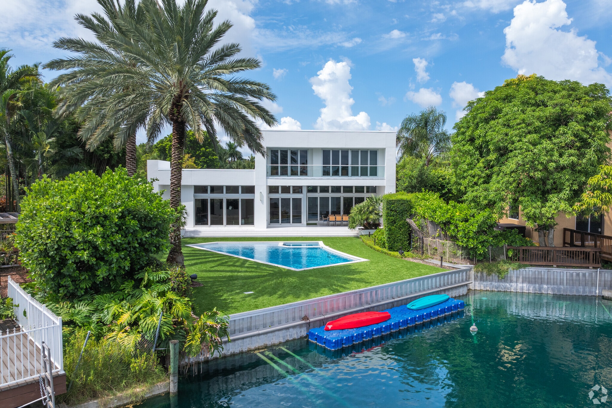 Experience luxury in Emerald Hills modern waterfront homes with lakefront views.