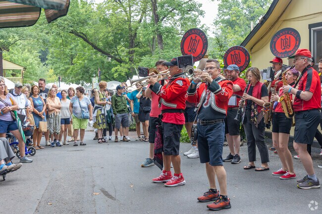 A marching band performs for the patrons of the Mount Gretna Arts Fest near South Londonderry.