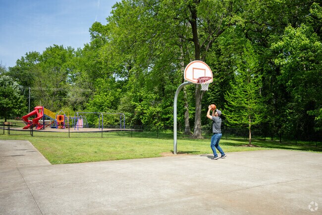 Locals enjoy going to the
South Converse Neighborhood Park to play basketball.