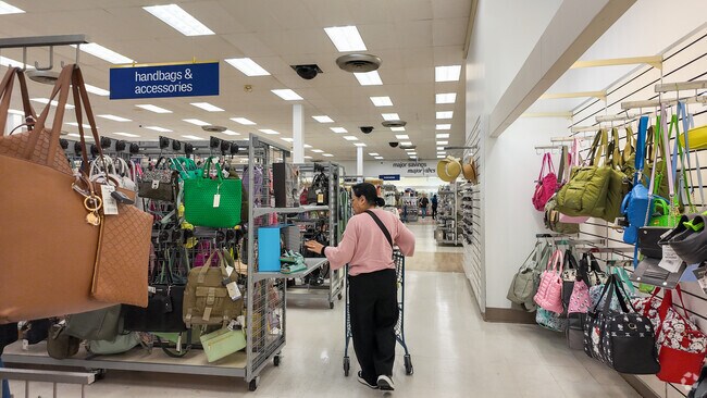 A lady enjoys her day shopping at Marshall's in Sherwood Forest.