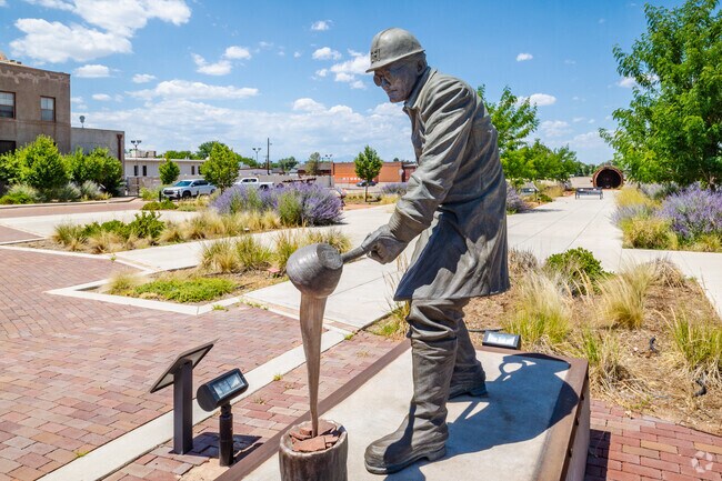 A statute dedicated to the area’s Steel Workers sits outside The Steelworks Center of the West i