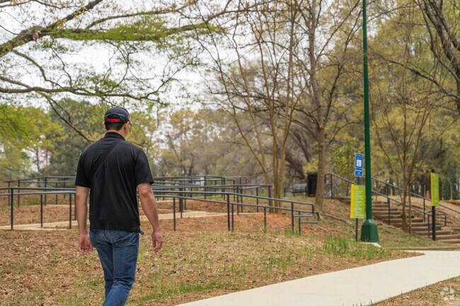 Blair Villa-Poole Creek’s Harper Park includes scenic walking trails that wrap through the wooded area.