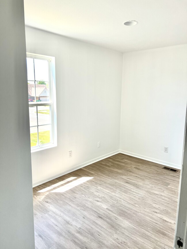 One of three bedrooms