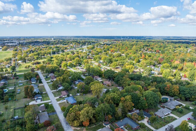 Orchard Heights has a full canopy of mature trees providing shade on a summer day.
