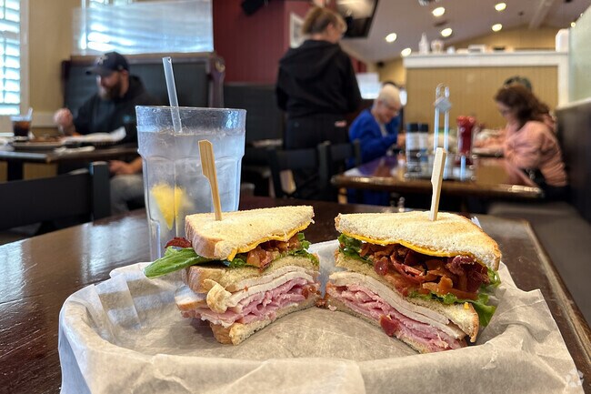 Sam’s Food & Spirits is a classic American restaurant serving traditional diner food.