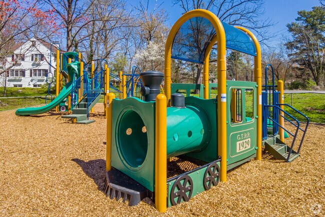Children jump aboard Kensington Cabin Park’s miniature locomotive.