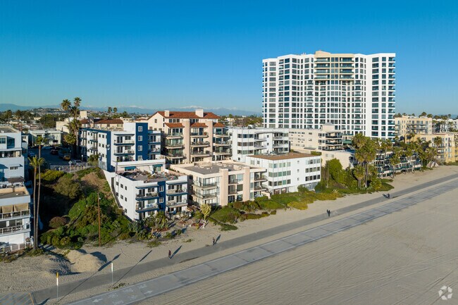 Condo properties large and small terrace the hill directly adjacent to the ocean.