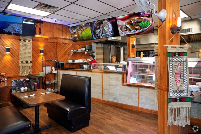 The Kabob House in Galeville, NY has food items on display as well as booths for dining in.