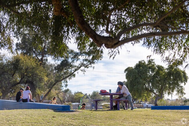 Take shade under one of the many Mesquite trees at Limberlost Park.