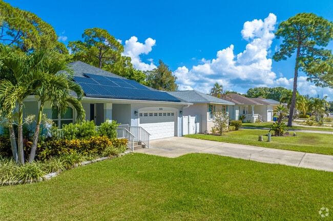 Palm trees shade compact lawns throughout Harcourt’s residential streets.