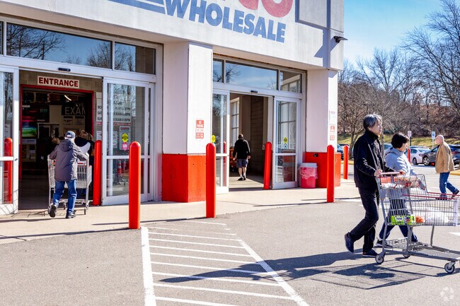Costco Wholesale, where you can buy items in bulk, is near Dix Hills in Commack.