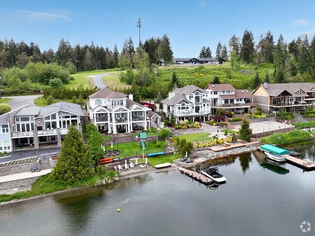 A row of stunning large family homes on Clear Lake in Graham.