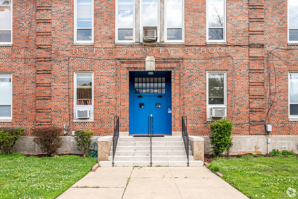 The entrance doors at Holy Family Elementary School in the Tuxedo, Alabama.