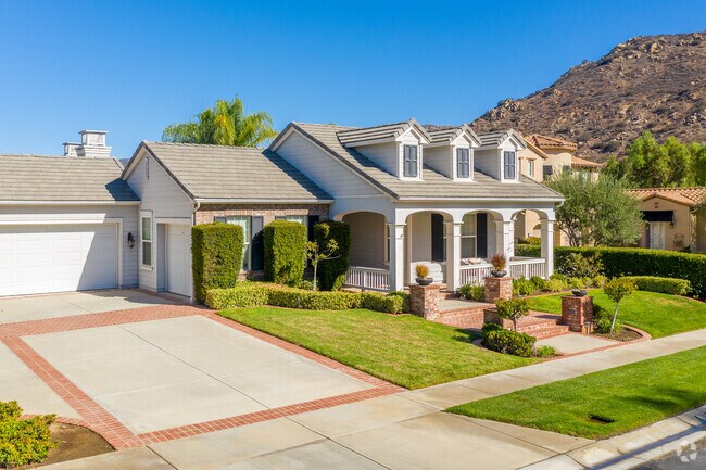Homes in the San Pasqual neighborhood feature perfectly trimmed landscaping.