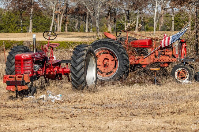 In Rockvale, classic red tractors have become popular yard ornaments.