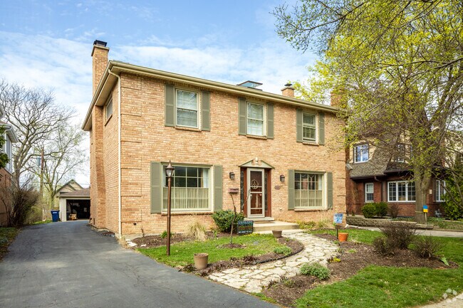 A colonial-style home enhances the charm of Forest Hills.
