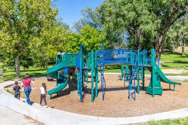 The tall trees of Roosevelt Park shade the 14-acre space, which features a disc golf course and a playground.