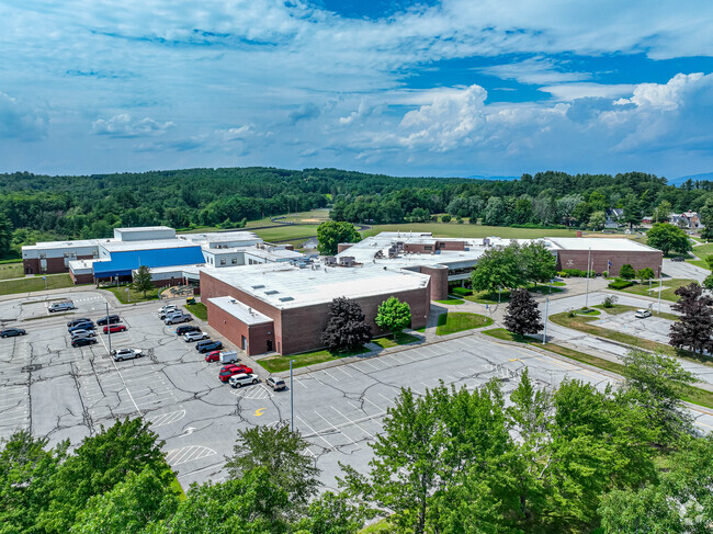Gilford Middle School sits in a big lot with lots of greenery.