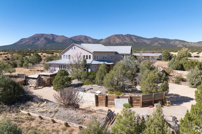 Stunning Northern New Mexico style home with mountain views in Cedar Grove.