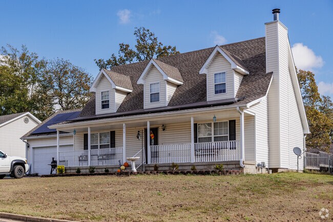 A large modern farmhouse offers plenty of floor space in Forest Ridge.