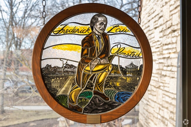 Stained glass of town founder located inside of the town library.