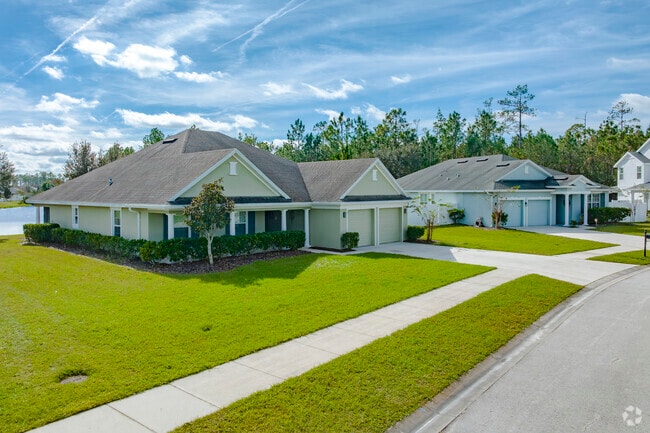 A spacious front porch is a popular feature for this Deer Creek row of homes.