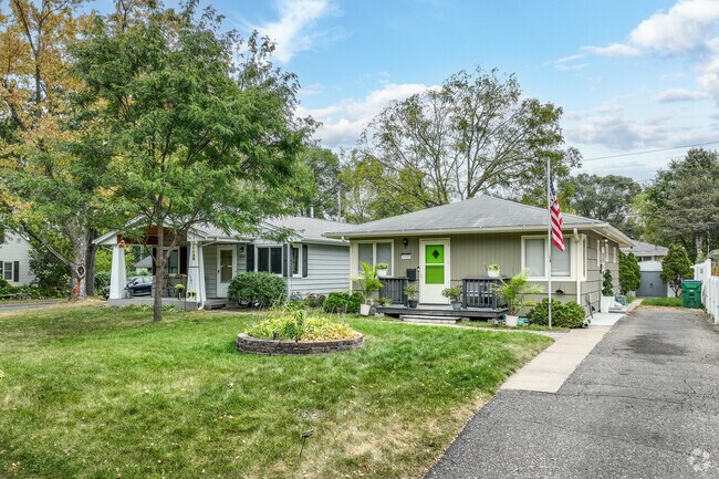 Lush landscaping and 
patriotic flags are common place in the Eliot neighborhood.