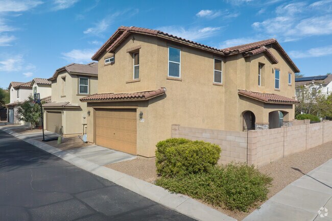 With a two-car garage and a bricked in yard, this Casas de Carlos home could be yours.