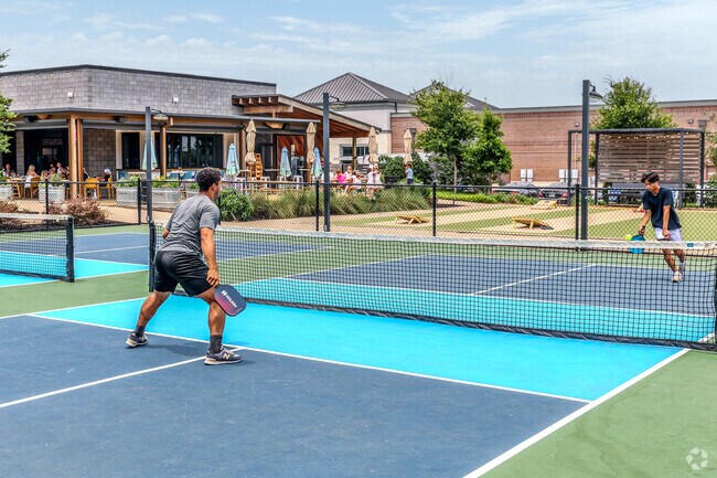 Before sitting down to eat, Heath locals head to the pickleball courts at Standard Service.