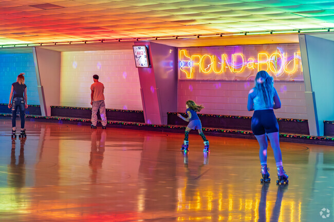 Families from Seventy-First enjoy the family night at the Round-A-Bout Skating Center.