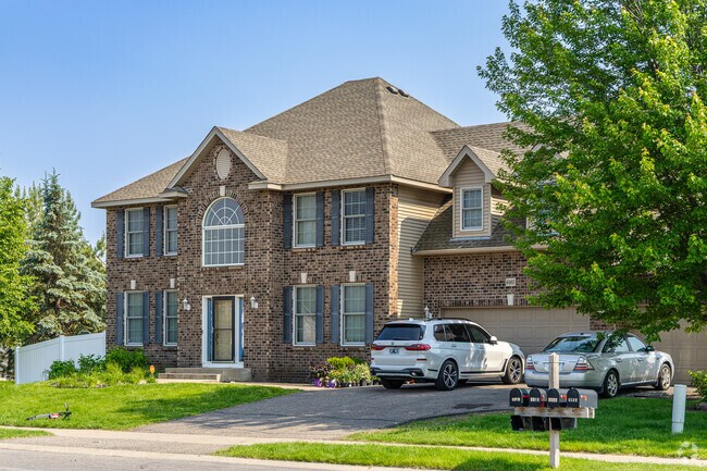 Oak Grove features many brick Neo Traditional homes with attached garages.