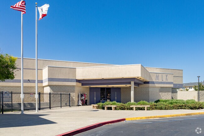 An American flag waves high above the entrance to Martin Luther King Jr. Elementary School.