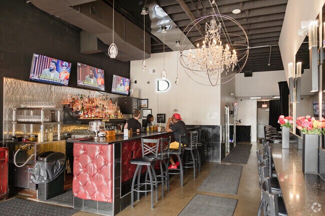 Grab dinner and drinks at Good Times on the Ave, outside Palmer Park.