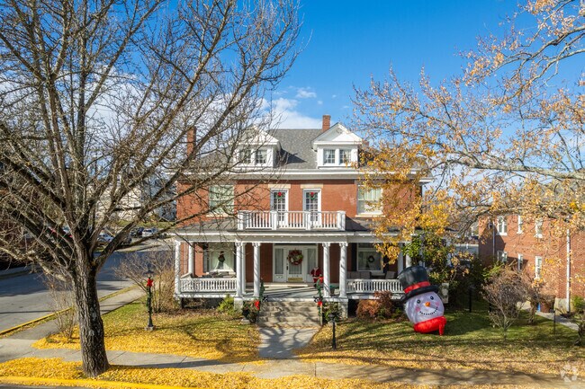 Some of the homes along Main Street in Winchester are very large and overlook the busy streets.