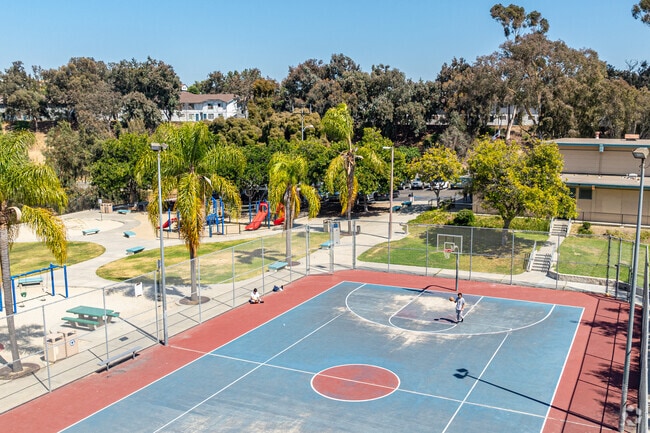 Paradise Hills Recreation Center features a playground and basketball court.