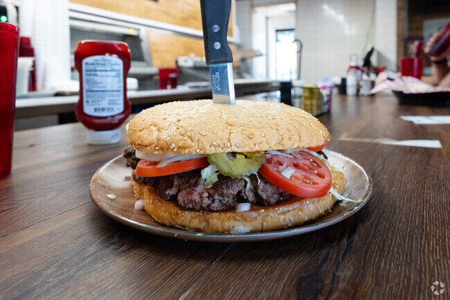 The Boss Hawg burger at Hickory Pitt is a 3 & 1/2 pound burger challenge with delicious flavor.