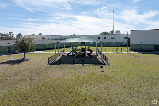 Cypress Springs Elementary School has a cover offering shade from the sun.