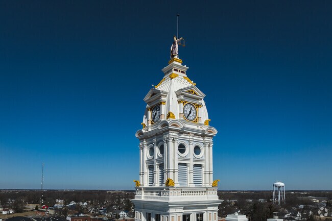 Lady Justice stands atop the Municipal Court in downtown Napoleon.