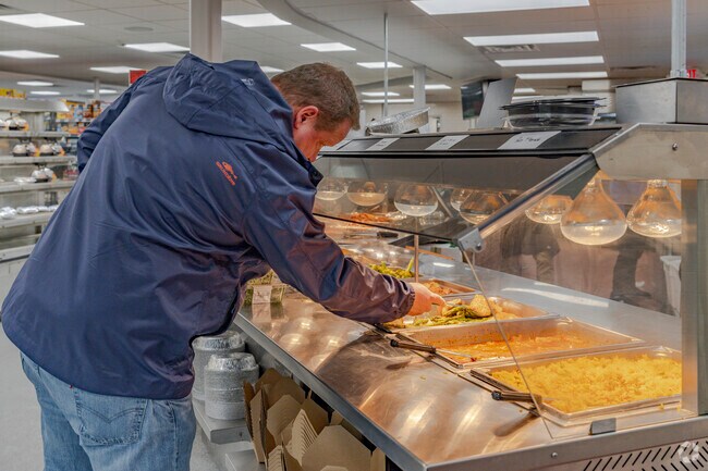 The hot food section of Lily's Weston Market is a popular lunch destination near Coleytown.